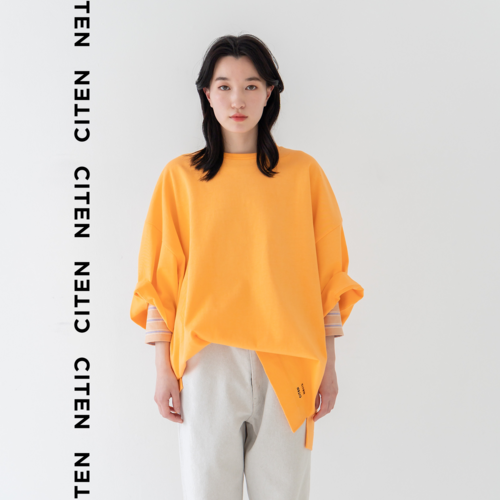 ユニセックスな着こなし