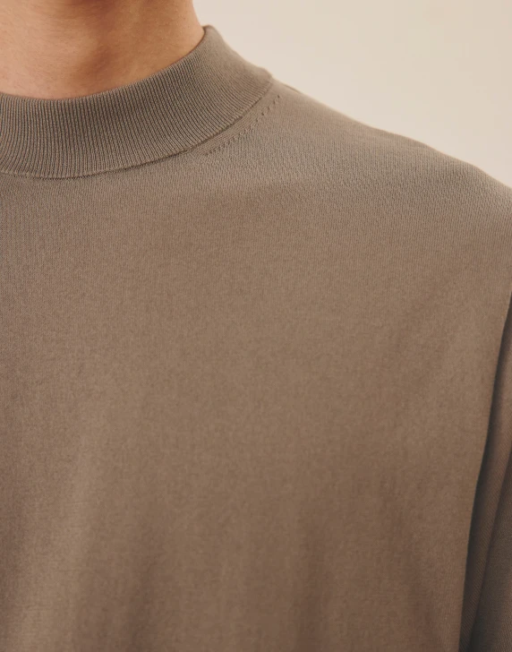 MOCK NECK KNIT & DOTAIR TROUSERS DETAIL